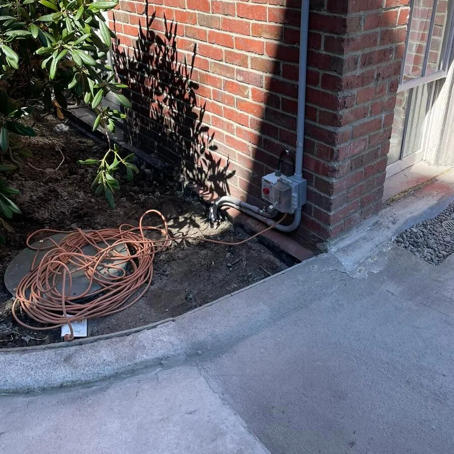 Septic system conduit run with the trench backfilled