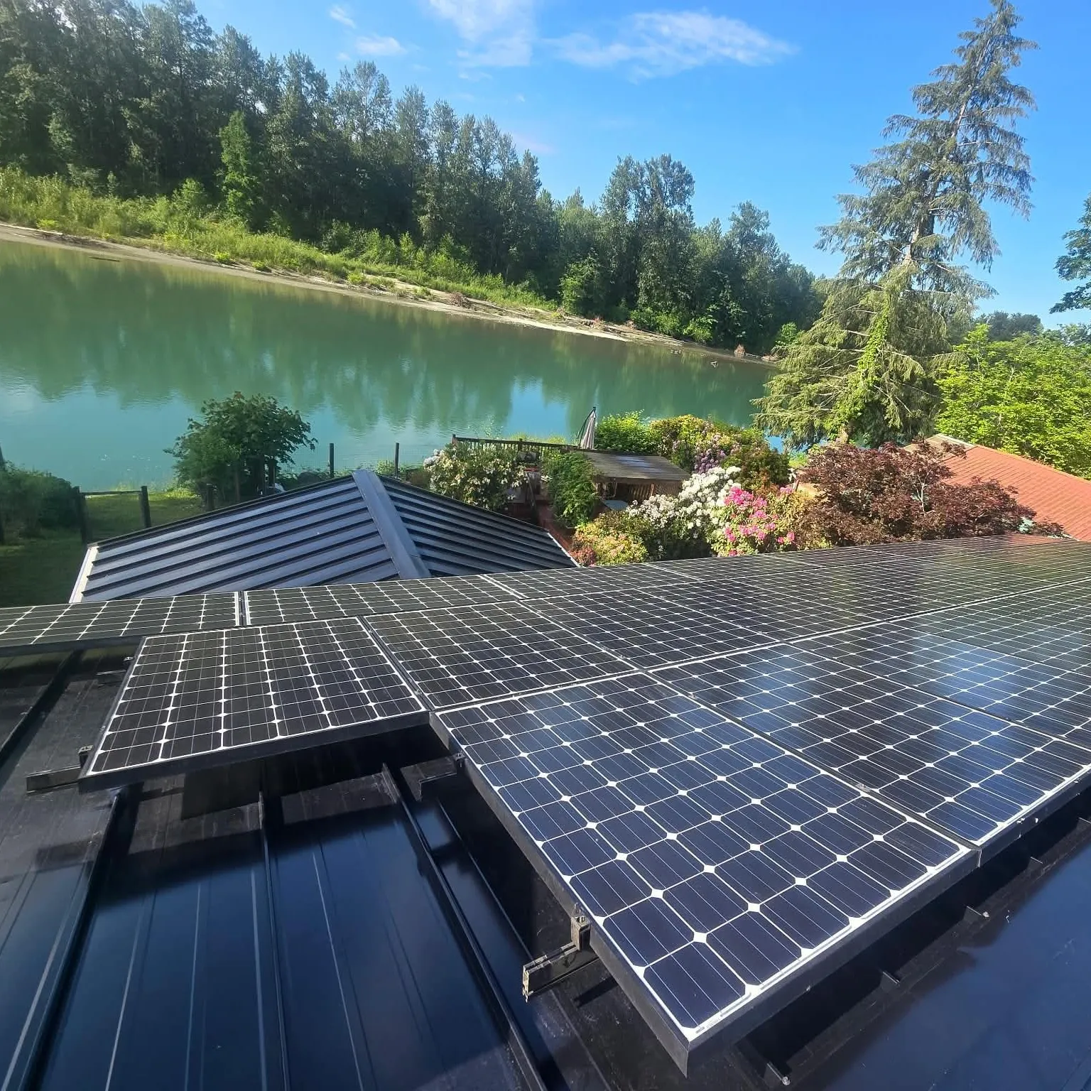 Completed rooftop solar array with every panel mounted and wired