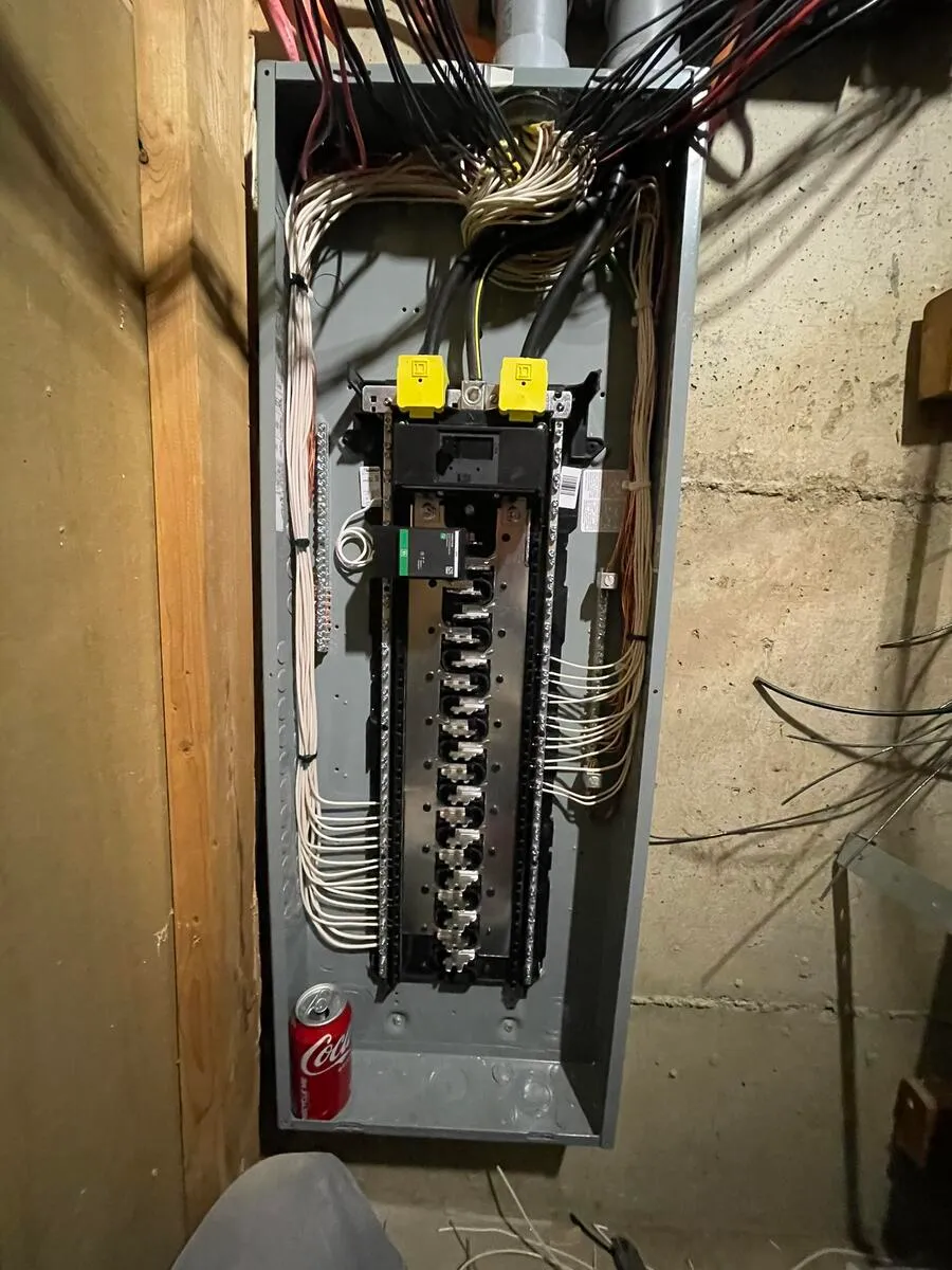 Panel upgrade in progress with new wiring being connected
