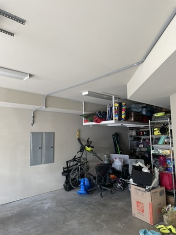 Conduit continuing around the corner toward the panel