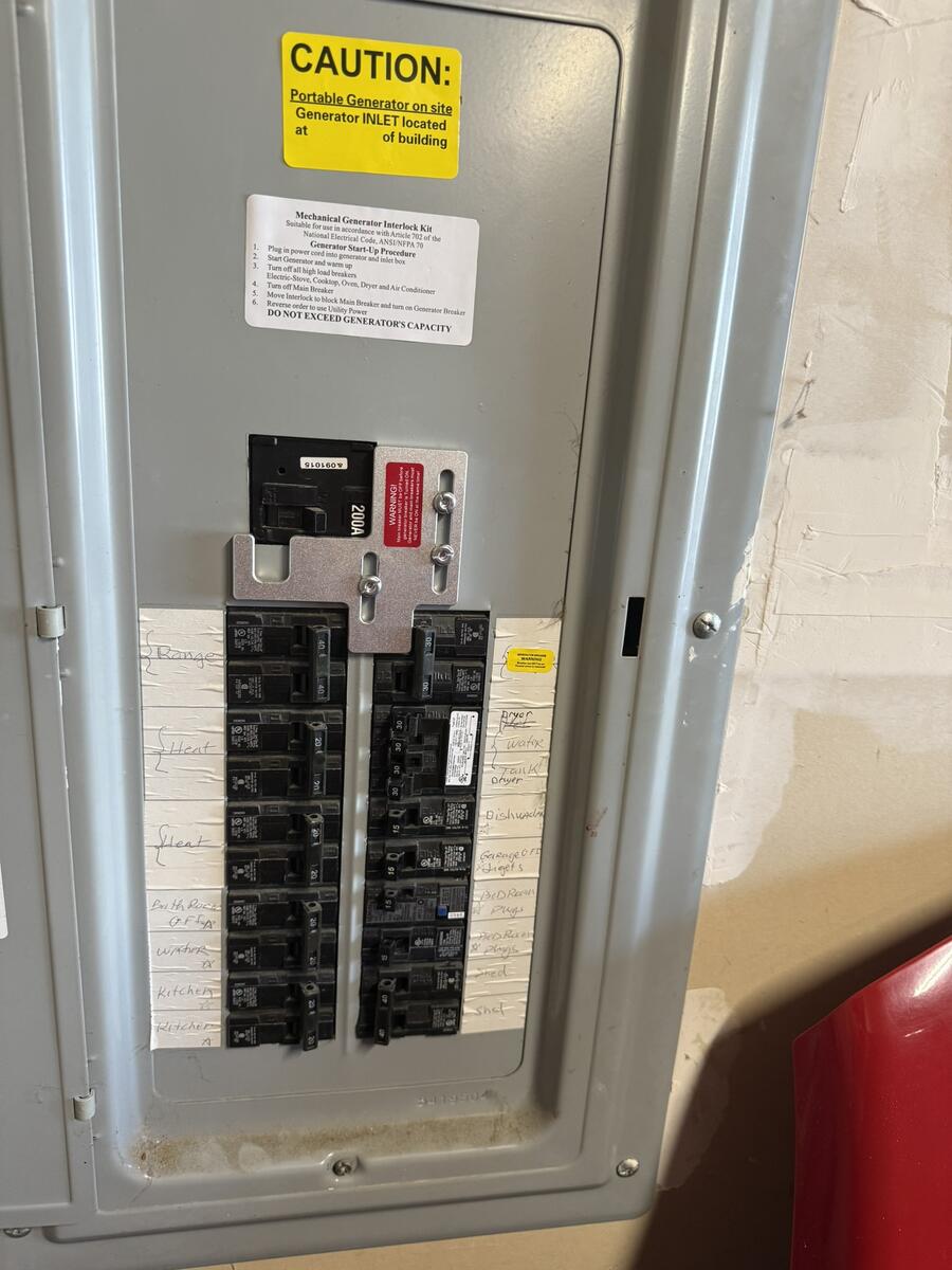 Exterior power inlet box for portable generator hookup on home siding