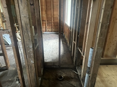 New wiring being routed through the second room