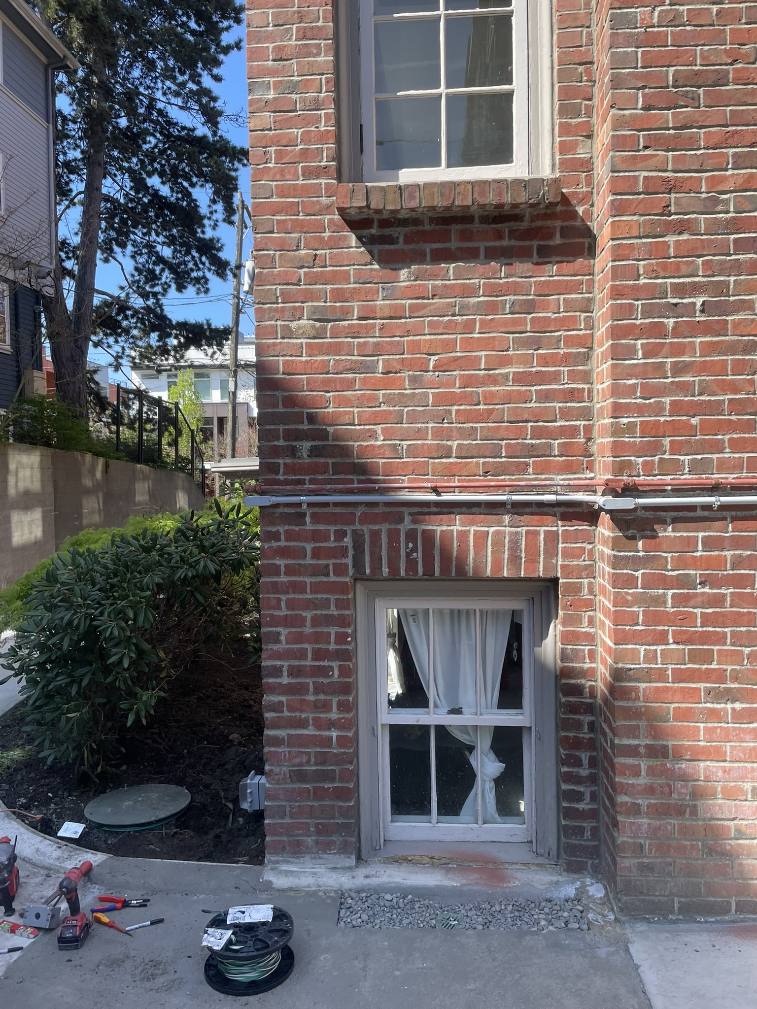 Start of the conduit run heading toward the electrical panel